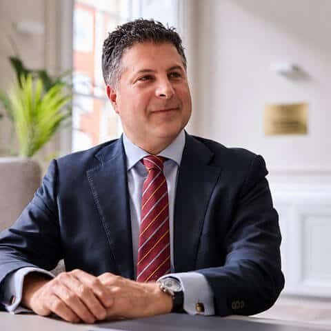 Dr Dionysis Papadatos-Pastos, consultant medical oncologist, discussing GLP-1 receptor agonists and lung cancer research at his London practice