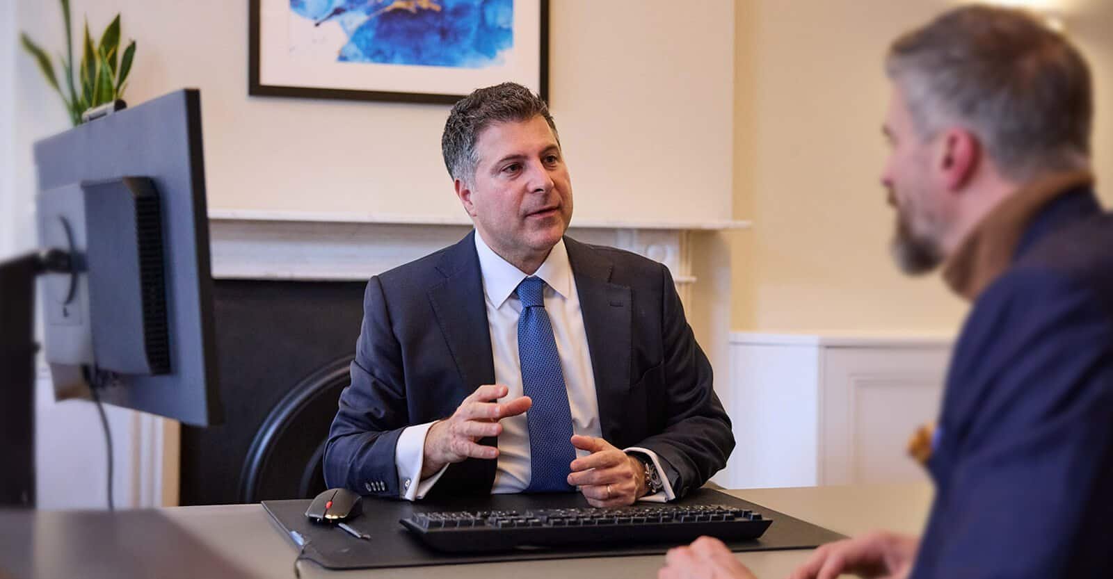 Dr Dionysis Papadatos-Pastos, consultant medical oncologist, during a patient consultation discussing lung cancer diagnosis and treatment options